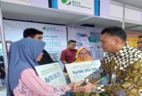 Peringatan Bulan K3 2025, BPJS Ketenagakerjaan Serahkan Santunan Kepada Ahli Waris.
