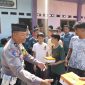 Kasat Lantas Polres Demak, AKP Thoriq Aziz, diacara bakti sosial sekaligus sosialisasi kepatuhan berlalu lintas di Pondok Pesantren Tazzaka, Desa Katonsari, Kecamatan Demak.