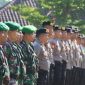 Anggota Polres Demak dan Kodim 0716/Demak mengikuti apel bersama, Minggu (31/8/2025).
