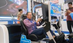 PLN Hadirkan Simulator Game Berkendara dengan Mobil Listrik di GIIAS 2025