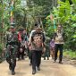 Bupati Wonosobo, Afif Nurhidayat meninjau hasil pembangunan TMMD.