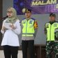 Bupati Demak, Eisti’anah memimpin Apel Gelar Pasukan Gabungan Pengamanan Malam Tahun Baru 2026 di Pendopo Parama Satwika Mapolres Demak, Rabu (31/12/2025) sore.