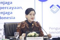 Ketua Dewan Komisioner OJK, Friderica Widyasari Dewi, memberikan sambutan di acara OJK Banking Forum 2026 di Kantor OJK Pusat, Selasa (14/7/2026).