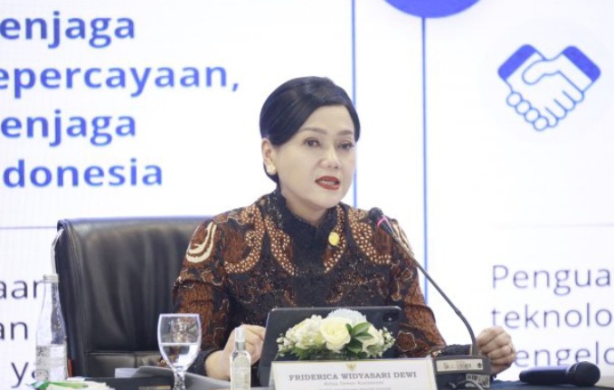 Ketua Dewan Komisioner OJK, Friderica Widyasari Dewi, memberikan sambutan di acara OJK Banking Forum 2026 di Kantor OJK Pusat, Selasa (14/7/2026).